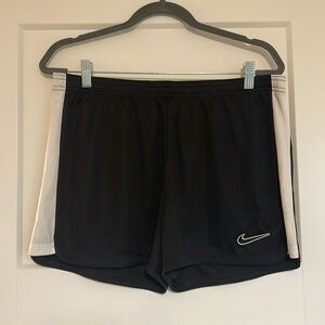 black nike soccer shorts, size large